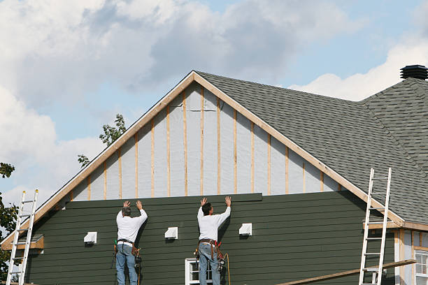 Professional Siding Replacement technician working in Bloomington, IN